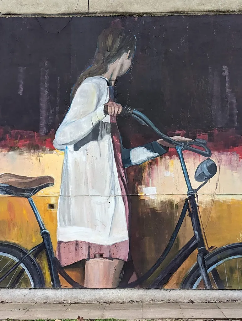 Mural by Wasp Elder - Girl with bycicle