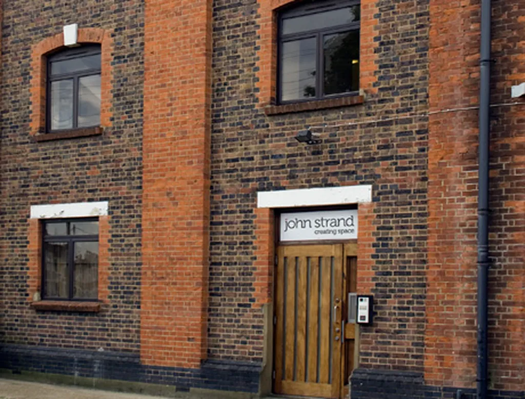 JOHN STRAND KITCHENS & WALL BEDS - Showroom visits by appointment only